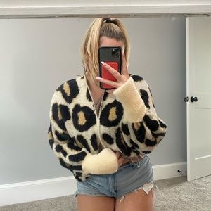 Leopard print sweater/cardigan . Fits large/extra large. Never worn, very warm!